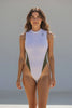 video of woman wearing a white and green high neck one piece swimsuit walking towards the camera